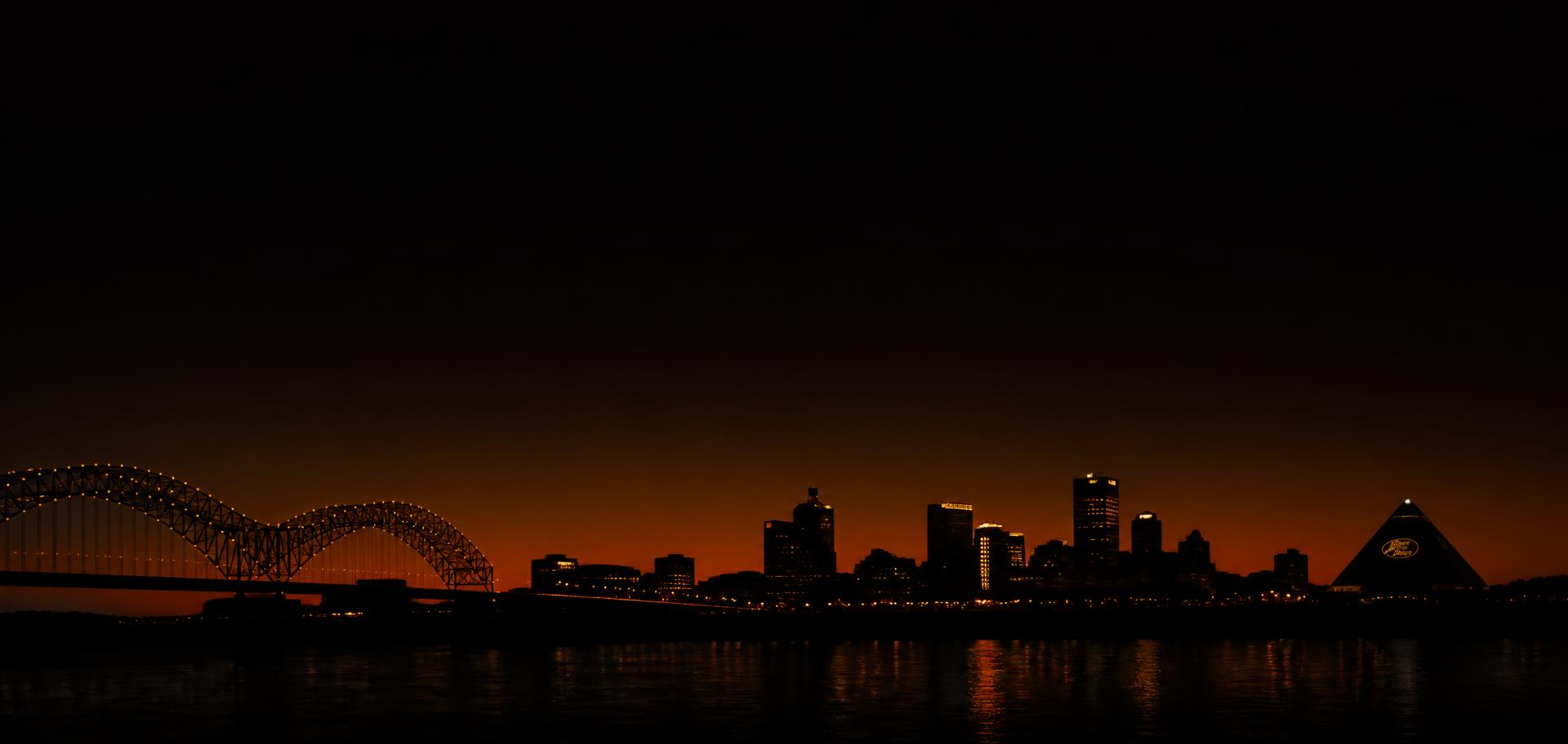 Memphis skyline at night with the Hernando de Soto bridge